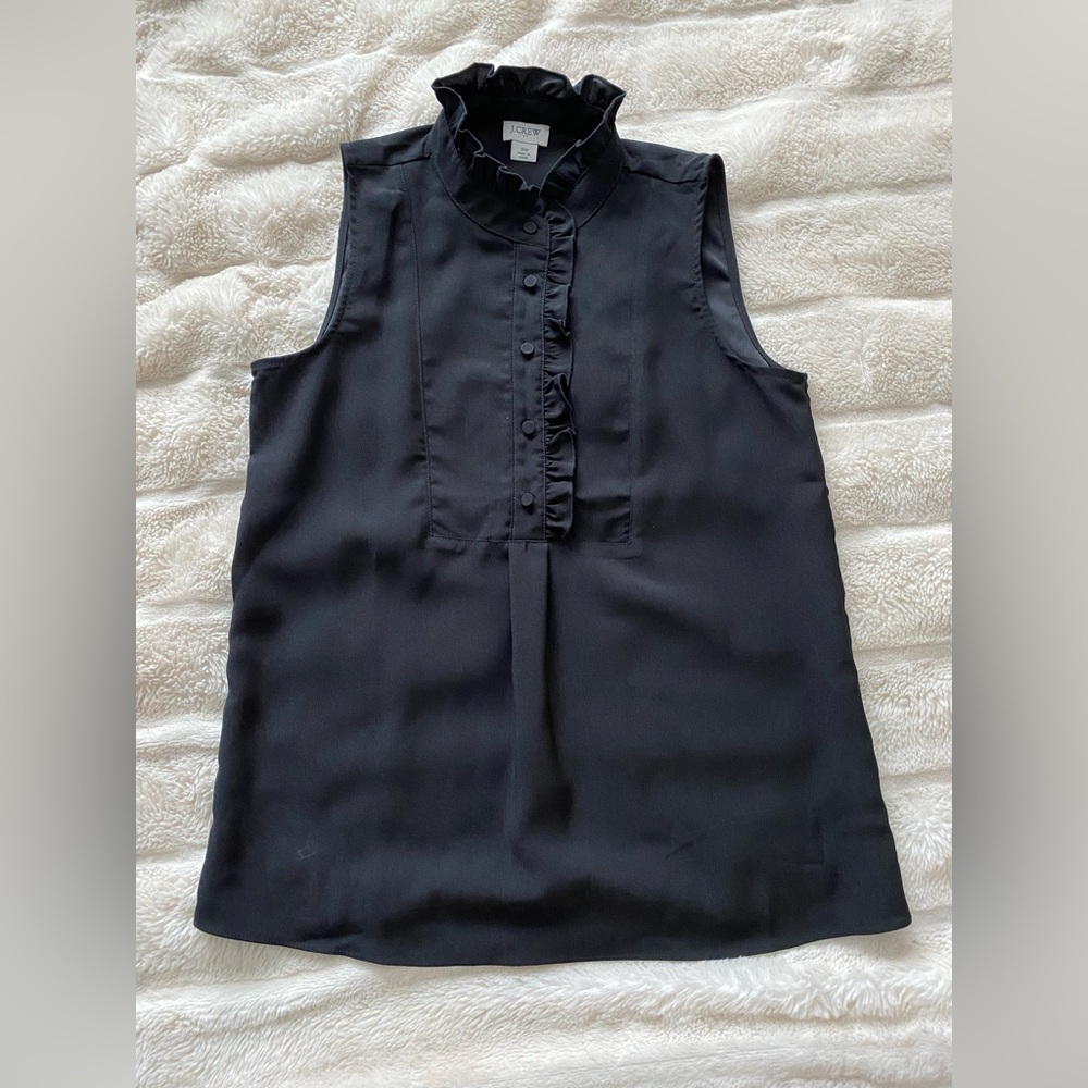 J. Crew black sleeveless blouse.